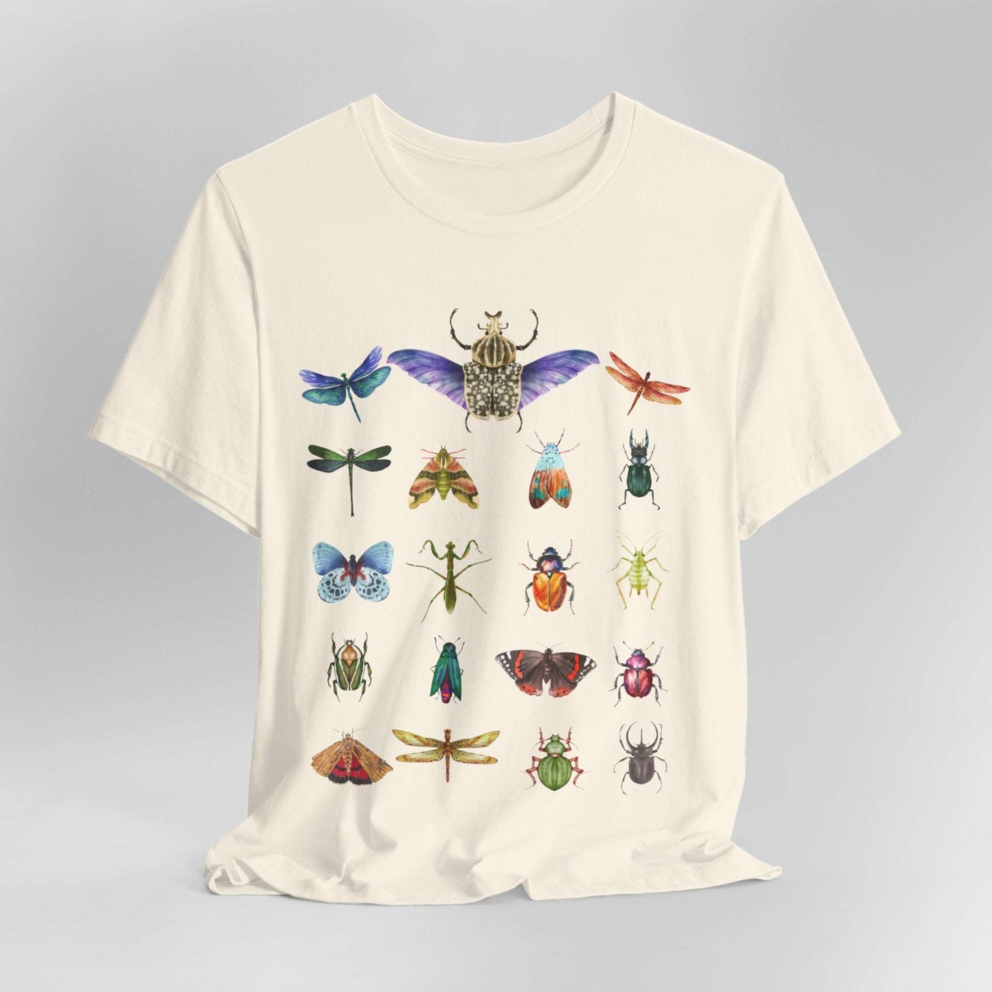 Bugs Entomology Insects T-shirt Cool Watercolour Bug and Beetle Shirt featuring an entomology-inspired insect design, perfect for bug lovers and nature enthusiasts. Made from soft, breathable 100% Airlume cotton, this unisex t-shirt is ideal for hiking, camping, and wildlife watching. Eco-friendly production by Bella+Canvas, with durable ribbed collars and a tear-away label for maximum comfort.