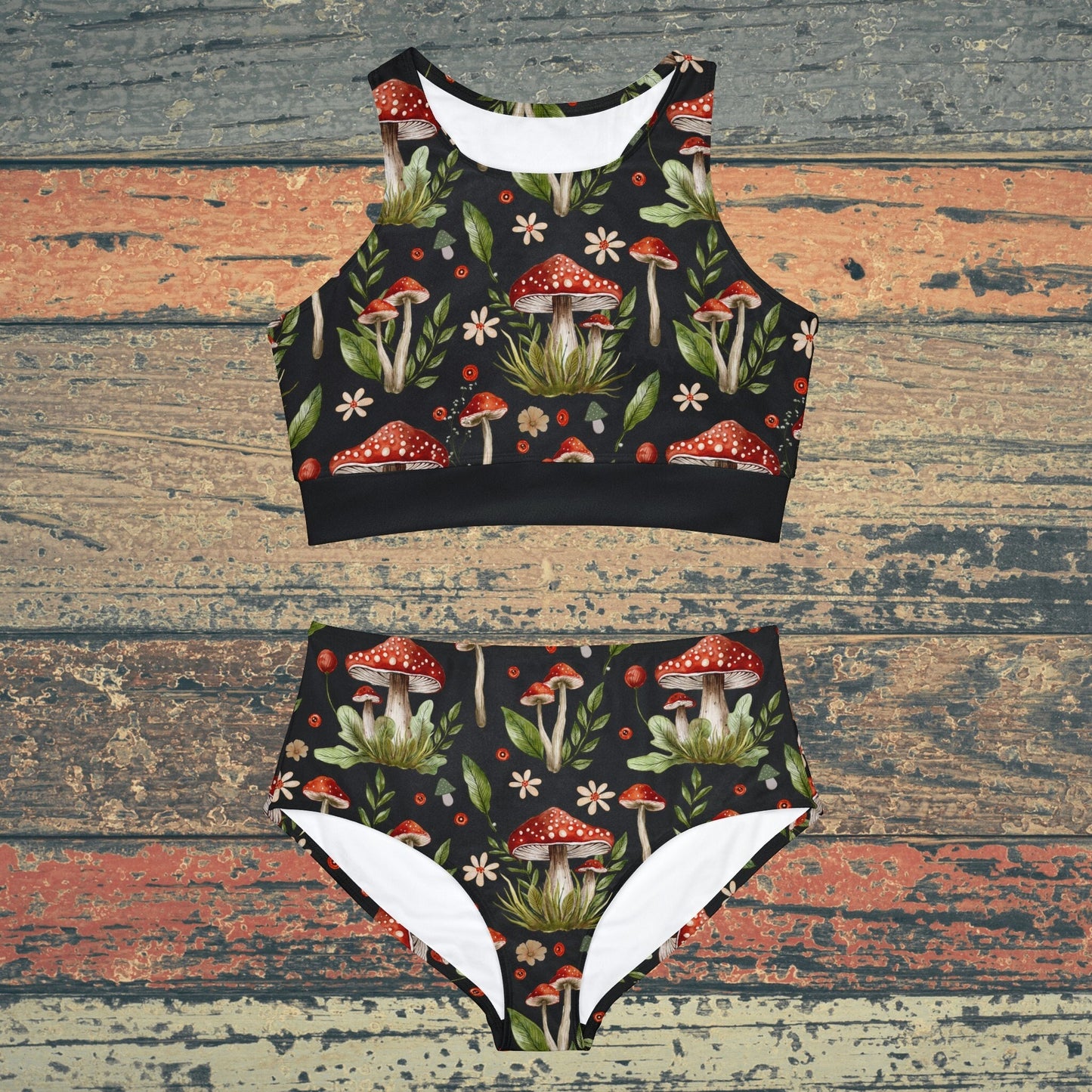 Cottagecore-inspired bikini set featuring a whimsical mushroom print. The swimwear has a botanical theme with witchy vibes, offering a charming and natural aesthetic. The bikini includes both top and bottom pieces, designed for a comfortable fit, perfect for nature lovers and those who embrace a cottagecore style.