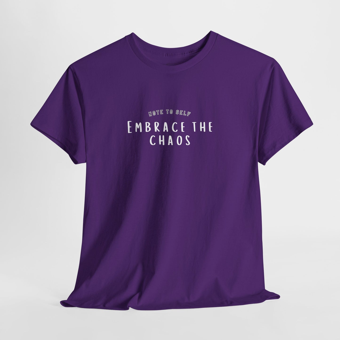 Embrace the Chaos cotton t-shirt featuring a minimalist graphic design, crafted from 100% medium-weight cotton for ultimate comfort and durability. This unisex classic fit humor t-shirt adds a humorous touch to any outfit, making it a great choice for casual wear. Perfect for those who appreciate funny shirts and embrace their weird side, this eco-friendly tee is ethically produced for quality and sustainability.