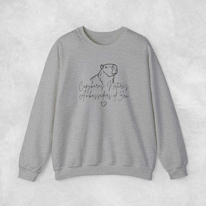 Capybaras: Nature's Ambassadors of Zen Crewneck Sweatshirt - Aurora Corner Shop