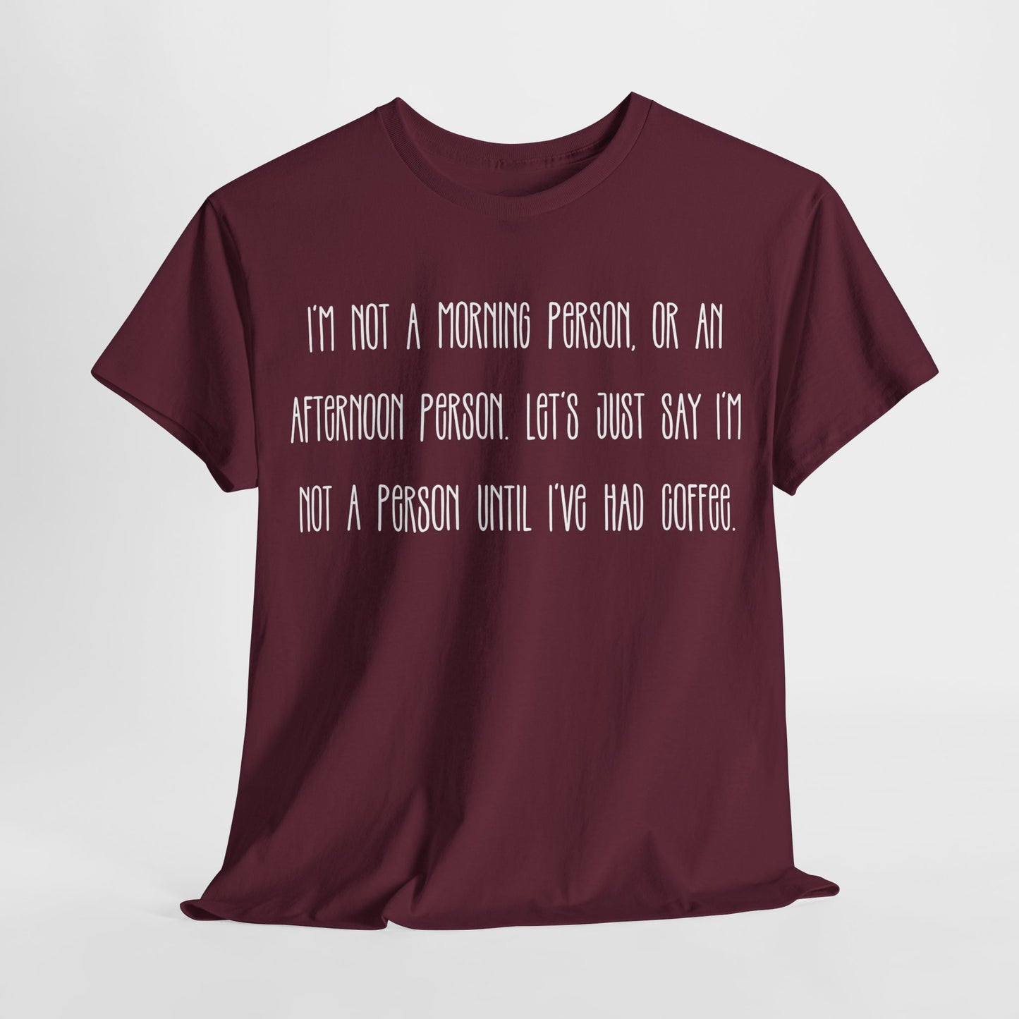 Not a Person Until I've Had Coffee t-shirt featuring a bold, humorous graphic design perfect for coffee lovers and those who aren't morning people. This funny shirt is made from soft, breathable fabric, ensuring comfort and style for casual wear. Ideal as a gift for coffee enthusiasts, this humor t-shirt showcases your love for caffeine and adds personality to your wardrobe.