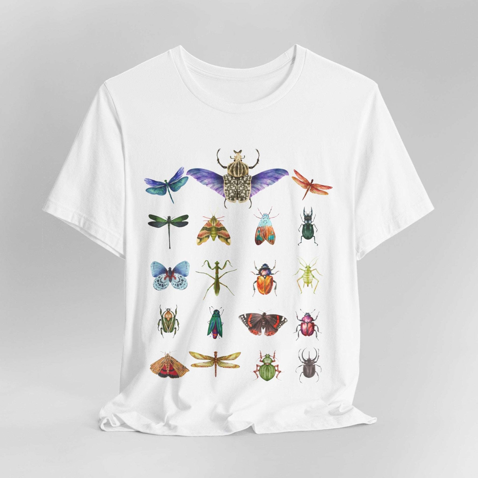 Bugs Entomology Insects T-shirt Cool Watercolour Bug and Beetle Shirt featuring an entomology-inspired insect design, perfect for bug lovers and nature enthusiasts. Made from soft, breathable 100% Airlume cotton, this unisex t-shirt is ideal for hiking, camping, and wildlife watching. Eco-friendly production by Bella+Canvas, with durable ribbed collars and a tear-away label for maximum comfort