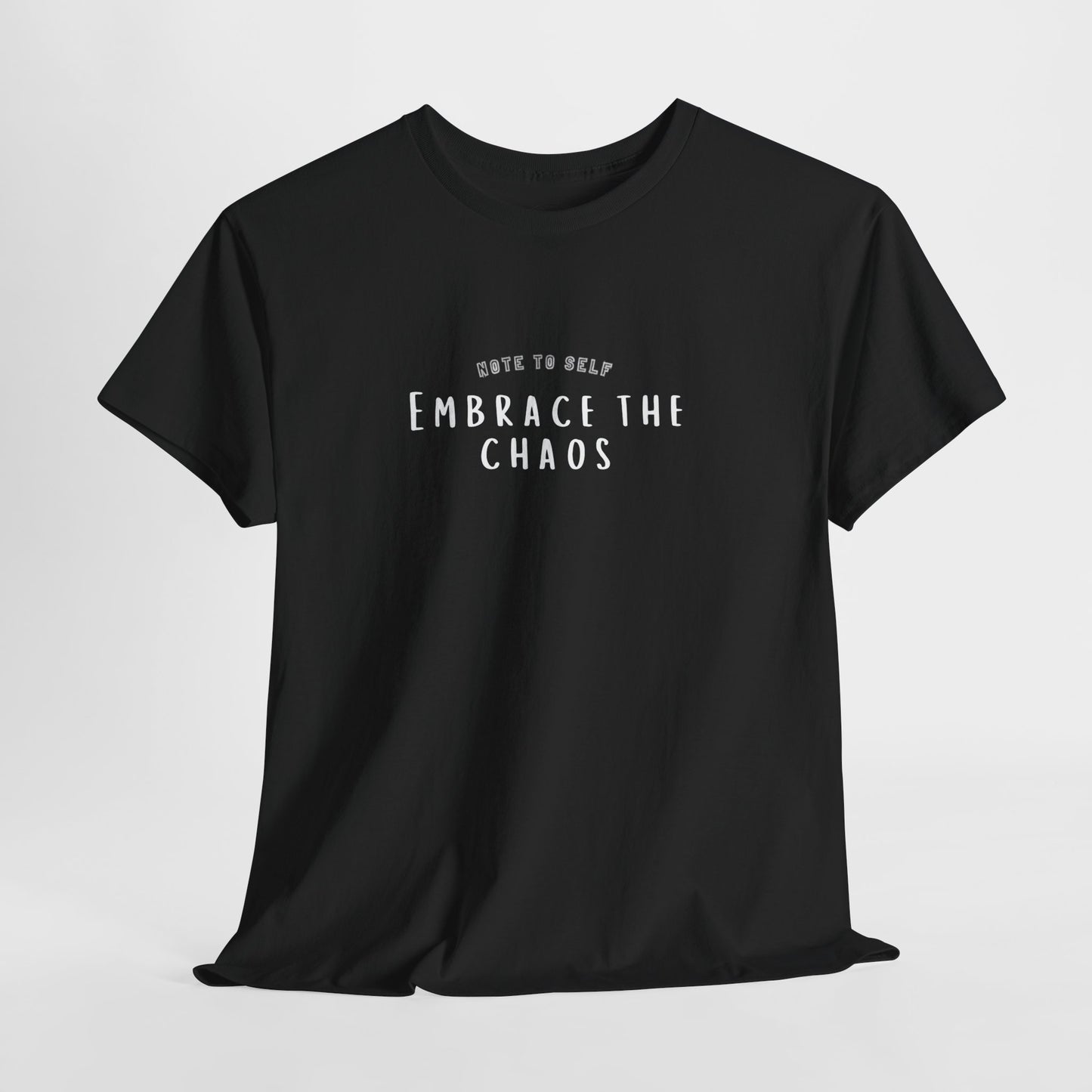 Embrace the Chaos cotton t-shirt featuring a minimalist graphic design, crafted from 100% medium-weight cotton for ultimate comfort and durability. This unisex classic fit humor t-shirt adds a humorous touch to any outfit, making it a great choice for casual wear. Perfect for those who appreciate funny shirts and embrace their weird side, this eco-friendly tee is ethically produced for quality and sustainability.