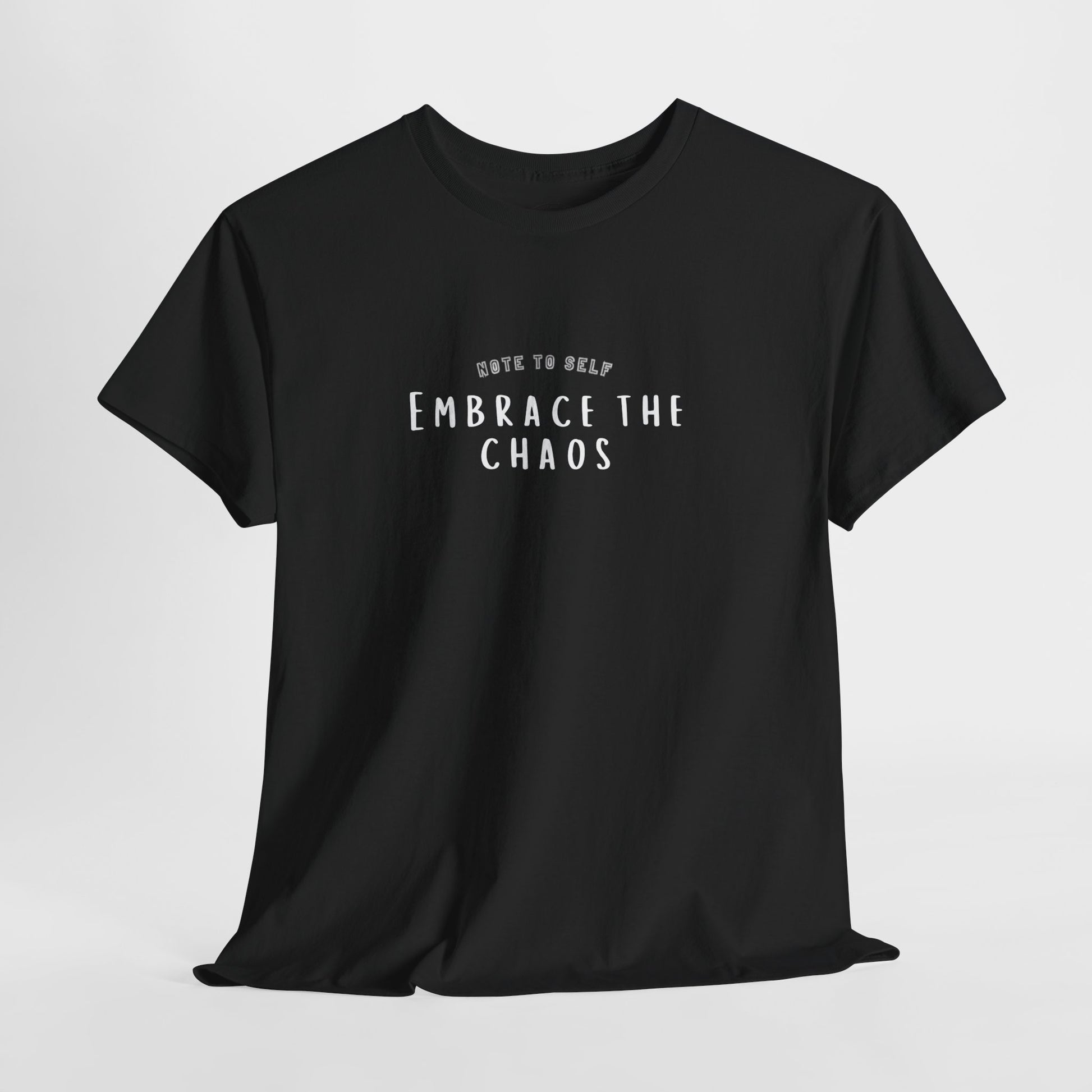 Embrace the Chaos cotton t-shirt featuring a minimalist graphic design, crafted from 100% medium-weight cotton for ultimate comfort and durability. This unisex classic fit humor t-shirt adds a humorous touch to any outfit, making it a great choice for casual wear. Perfect for those who appreciate funny shirts and embrace their weird side, this eco-friendly tee is ethically produced for quality and sustainability.