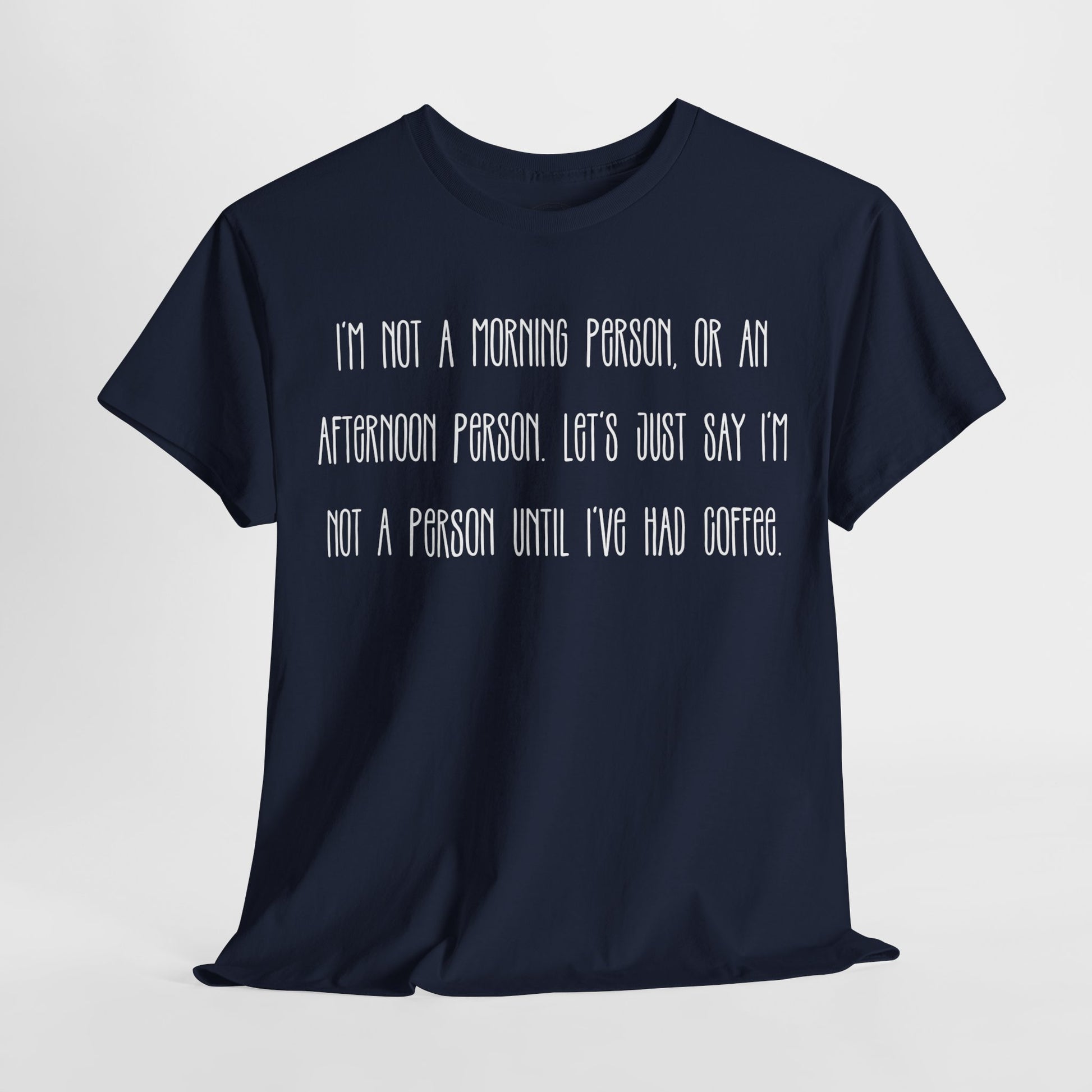 Not a Person Until I've Had Coffee t-shirt featuring a bold, humorous graphic design perfect for coffee lovers and those who aren't morning people. This funny shirt is made from soft, breathable fabric, ensuring comfort and style for casual wear. Ideal as a gift for coffee enthusiasts, this humor t-shirt showcases your love for caffeine and adds personality to your wardrobe