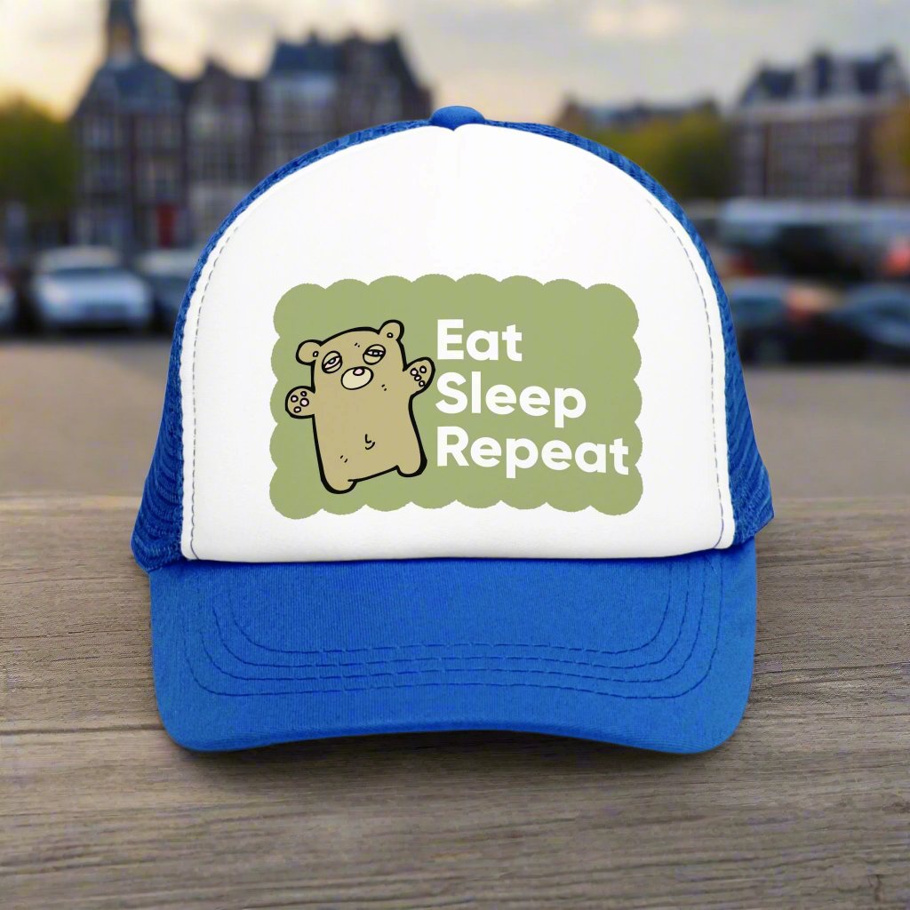 Retro vintage-style trucker hat with the text 'Eat Sleep Repeat' printed on the front. This snapback cap is designed for both men and women, featuring a distressed look and mesh back for a classic, funny style. Ideal as a silly gag gift for adults who enjoy humorous fashion accessories.