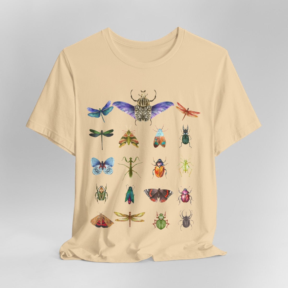 Cool Watercolour Bug and Beetle Shirt featuring an entomology-inspired insect design, perfect for bug lovers and nature enthusiasts. Made from soft, breathable 100% Airlume cotton, this unisex t-shirt is ideal for hiking, camping, and wildlife watching. Eco-friendly production by Bella+Canvas, with durable ribbed collars and a tear-away label for maximum comfort.