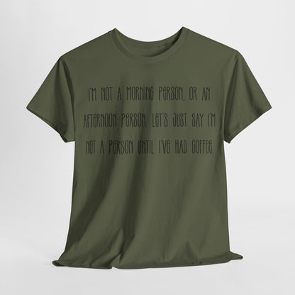 Not a Person Until I've Had Coffee t-shirt featuring a bold, humorous graphic design perfect for coffee lovers and those who aren't morning people. This funny shirt is made from soft, breathable fabric, ensuring comfort and style for casual wear. Ideal as a gift for coffee enthusiasts, this humor t-shirt showcases your love for caffeine and adds personality to your wardrobe.