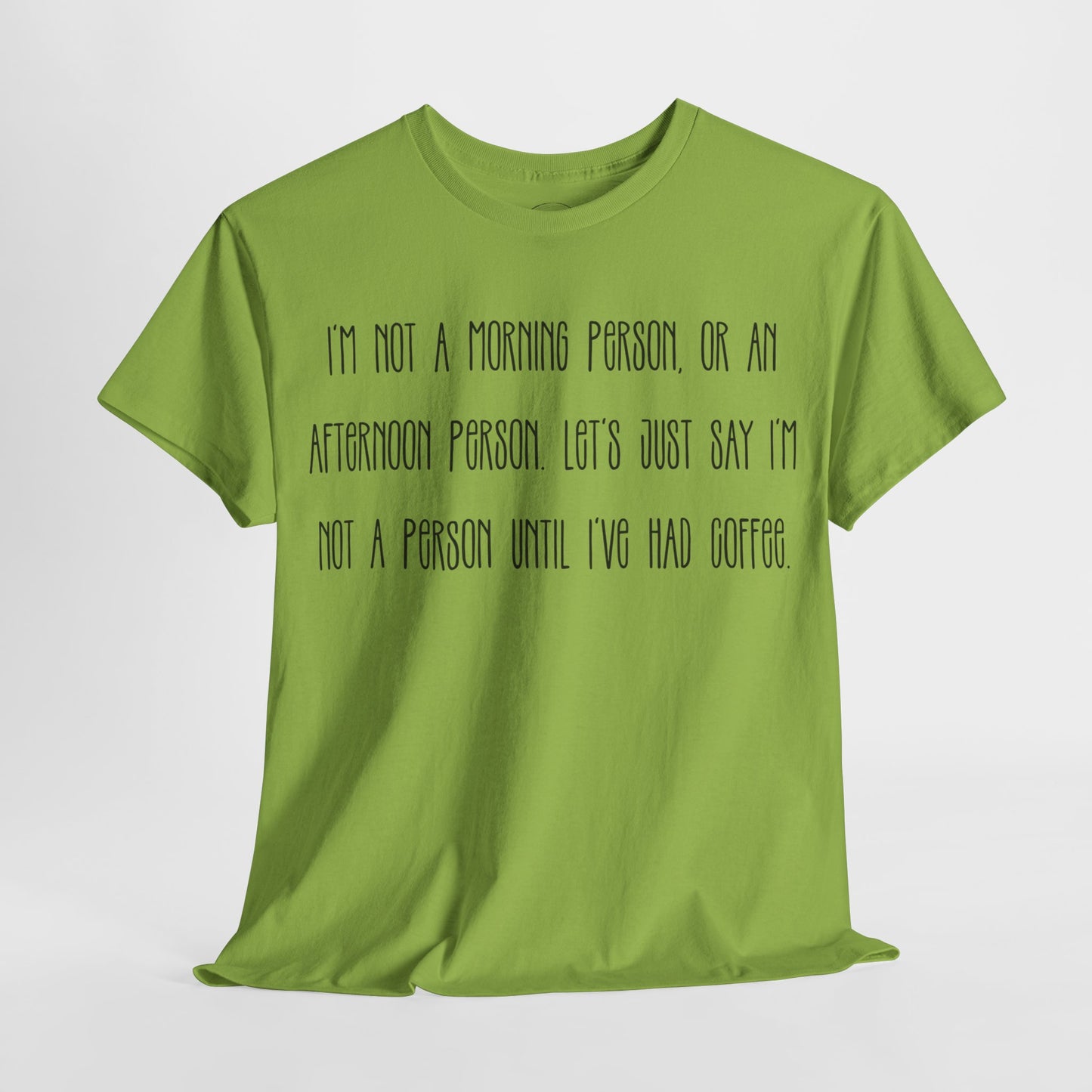 Not a Person Until I've Had Coffee t-shirt featuring a bold, humorous graphic design perfect for coffee lovers and those who aren't morning people. This funny shirt is made from soft, breathable fabric, ensuring comfort and style for casual wear. Ideal as a gift for coffee enthusiasts, this humor t-shirt showcases your love for caffeine and adds personality to your wardrobe.