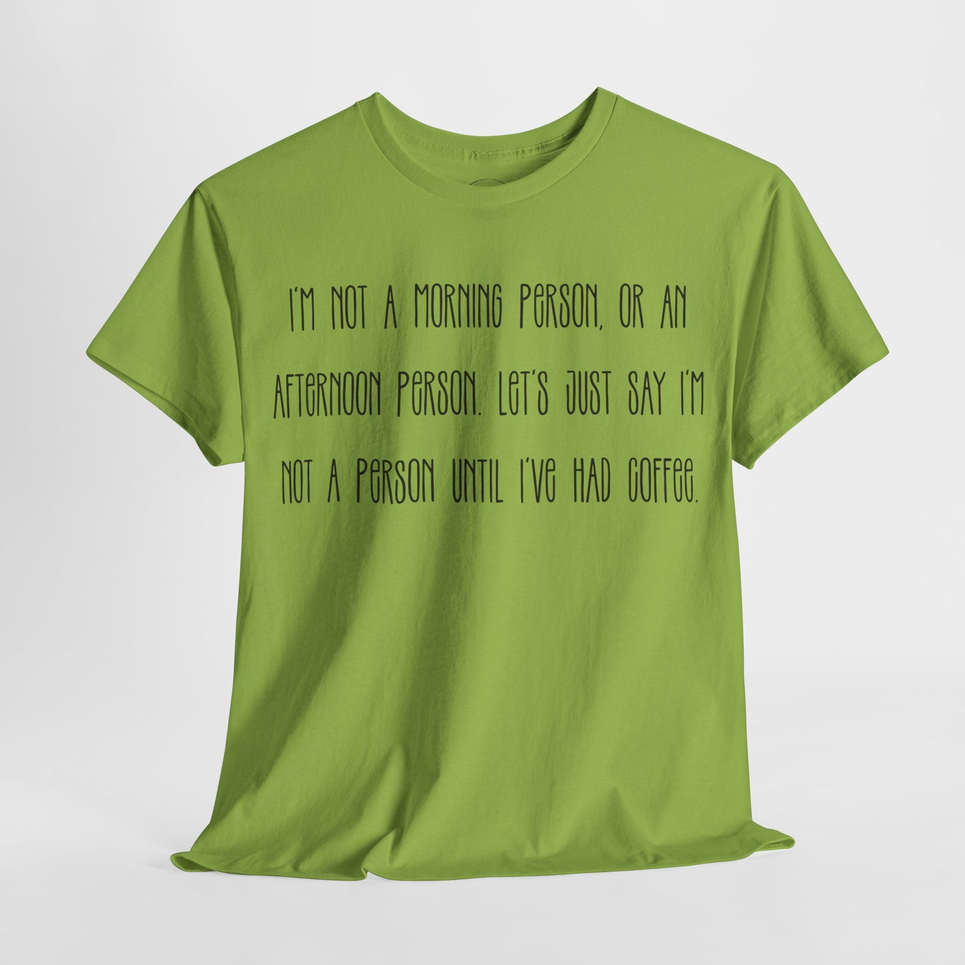 Not a Person Until I've Had Coffee t-shirt featuring a bold, humorous graphic design perfect for coffee lovers and those who aren't morning people. This funny shirt is made from soft, breathable fabric, ensuring comfort and style for casual wear. Ideal as a gift for coffee enthusiasts, this humor t-shirt showcases your love for caffeine and adds personality to your wardrobe.