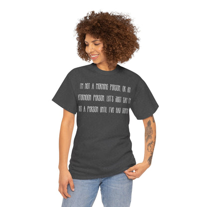 Not a Person Until I've Had Coffee t-shirt featuring a bold, humorous graphic design perfect for coffee lovers and those who aren't morning people. This funny shirt is made from soft, breathable fabric, ensuring comfort and style for casual wear. Ideal as a gift for coffee enthusiasts, this humor t-shirt showcases your love for caffeine and adds personality to your wardrobe