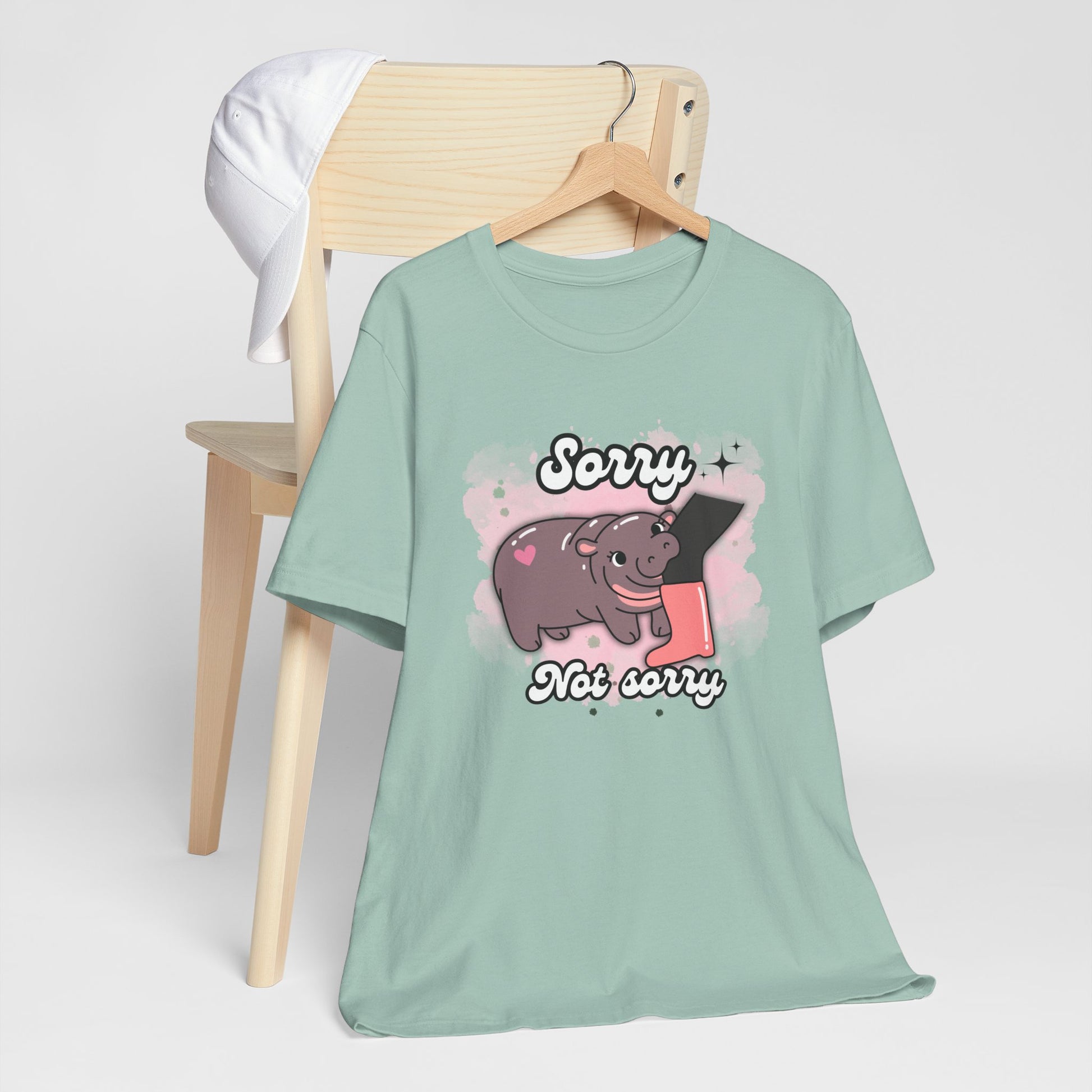 Adorable Pygmy Hippo Graphic Tee featuring a cute design of a viral baby hippo meme, made from soft cotton, perfect for animal lovers and casual wear, ideal for gifts and nature enthusiasts