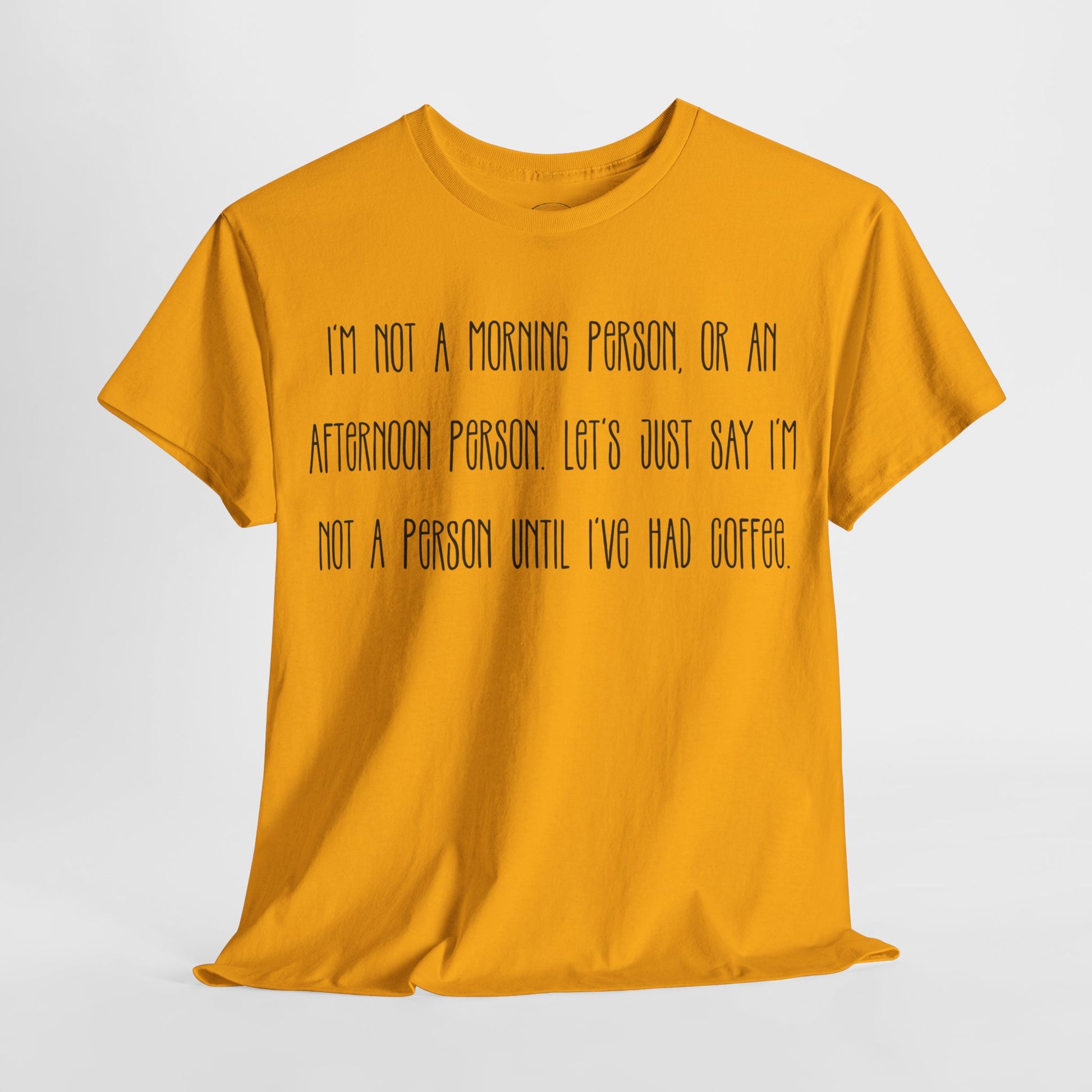 Not a Person Until I've Had Coffee t-shirt featuring a bold, humorous graphic design perfect for coffee lovers and those who aren't morning people. This funny shirt is made from soft, breathable fabric, ensuring comfort and style for casual wear. Ideal as a gift for coffee enthusiasts, this humor t-shirt showcases your love for caffeine and adds personality to your wardrobe.