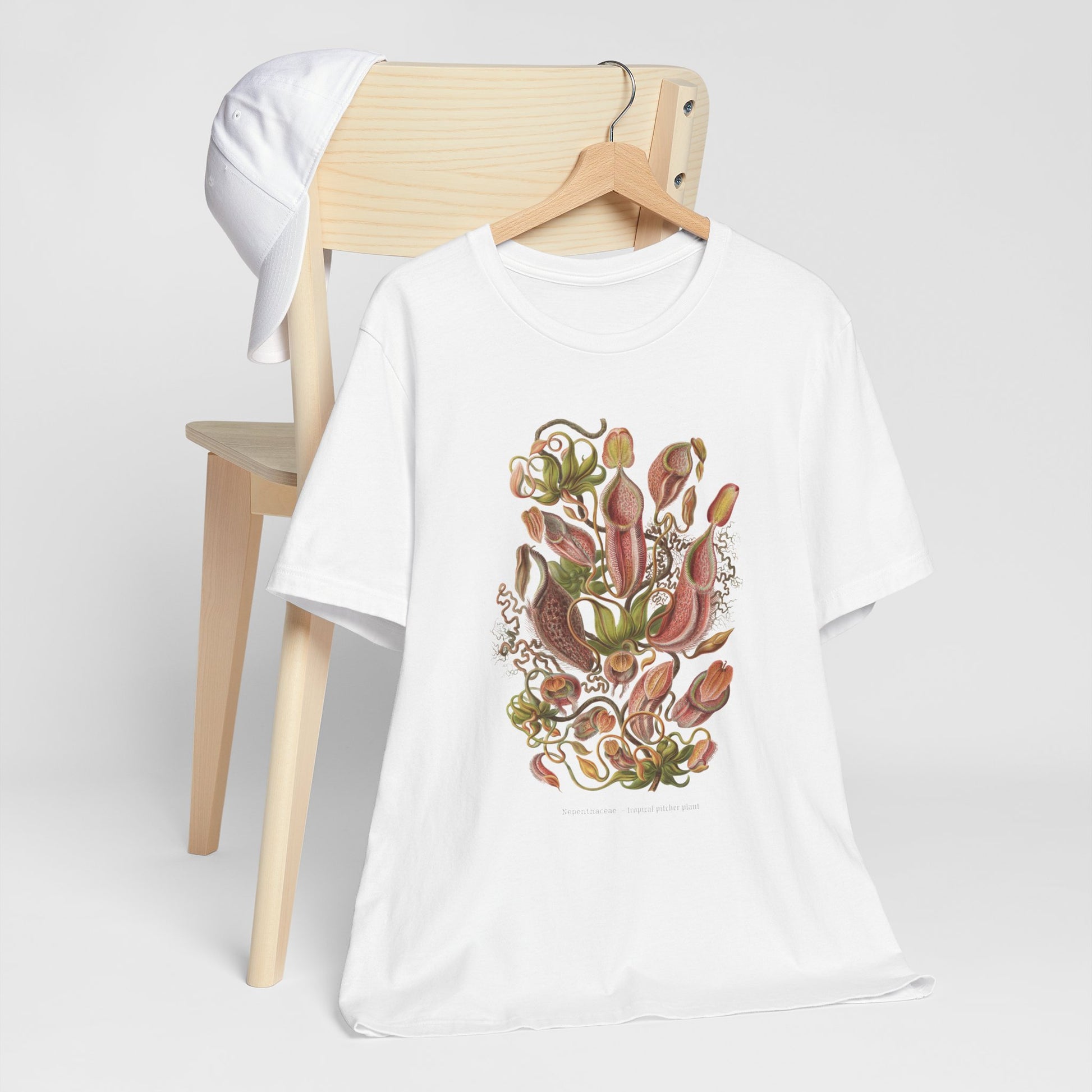 Vintage Nepenthes T-Shirt featuring a detailed botanical illustration of carnivorous plants, perfect for plant enthusiasts and lovers of unique, eco-friendly fashion