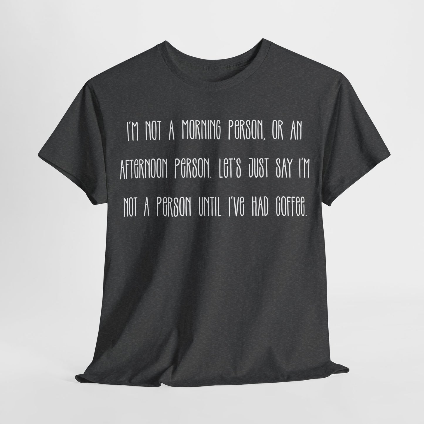 Not a Person Until I've Had Coffee t-shirt featuring a bold, humorous graphic design perfect for coffee lovers and those who aren't morning people. This funny shirt is made from soft, breathable fabric, ensuring comfort and style for casual wear. Ideal as a gift for coffee enthusiasts, this humor t-shirt showcases your love for caffeine and adds personality to your wardrobe.