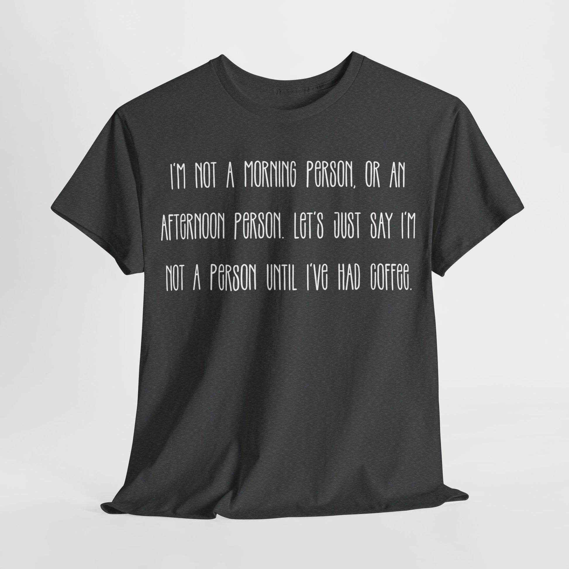 Not a Person Until I've Had Coffee t-shirt featuring a bold, humorous graphic design perfect for coffee lovers and those who aren't morning people. This funny shirt is made from soft, breathable fabric, ensuring comfort and style for casual wear. Ideal as a gift for coffee enthusiasts, this humor t-shirt showcases your love for caffeine and adds personality to your wardrobe.