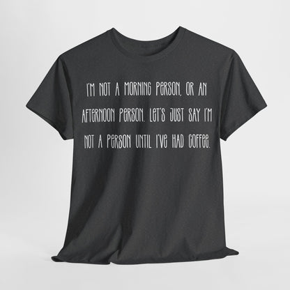 Not a Person Until I've Had Coffee t-shirt featuring a bold, humorous graphic design perfect for coffee lovers and those who aren't morning people. This funny shirt is made from soft, breathable fabric, ensuring comfort and style for casual wear. Ideal as a gift for coffee enthusiasts, this humor t-shirt showcases your love for caffeine and adds personality to your wardrobe.