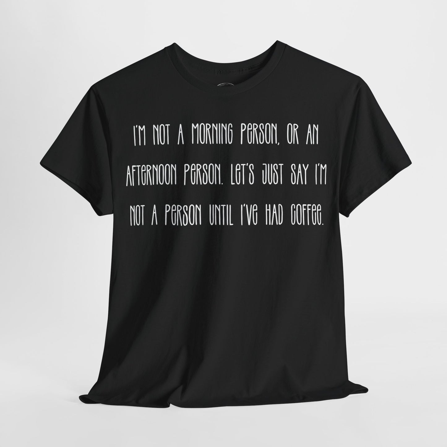 Not a Person Until I've Had Coffee t-shirt featuring a bold, humorous graphic design perfect for coffee lovers and those who aren't morning people. This funny shirt is made from soft, breathable fabric, ensuring comfort and style for casual wear. Ideal as a gift for coffee enthusiasts, this humor t-shirt showcases your love for caffeine and adds personality to your wardrobe.