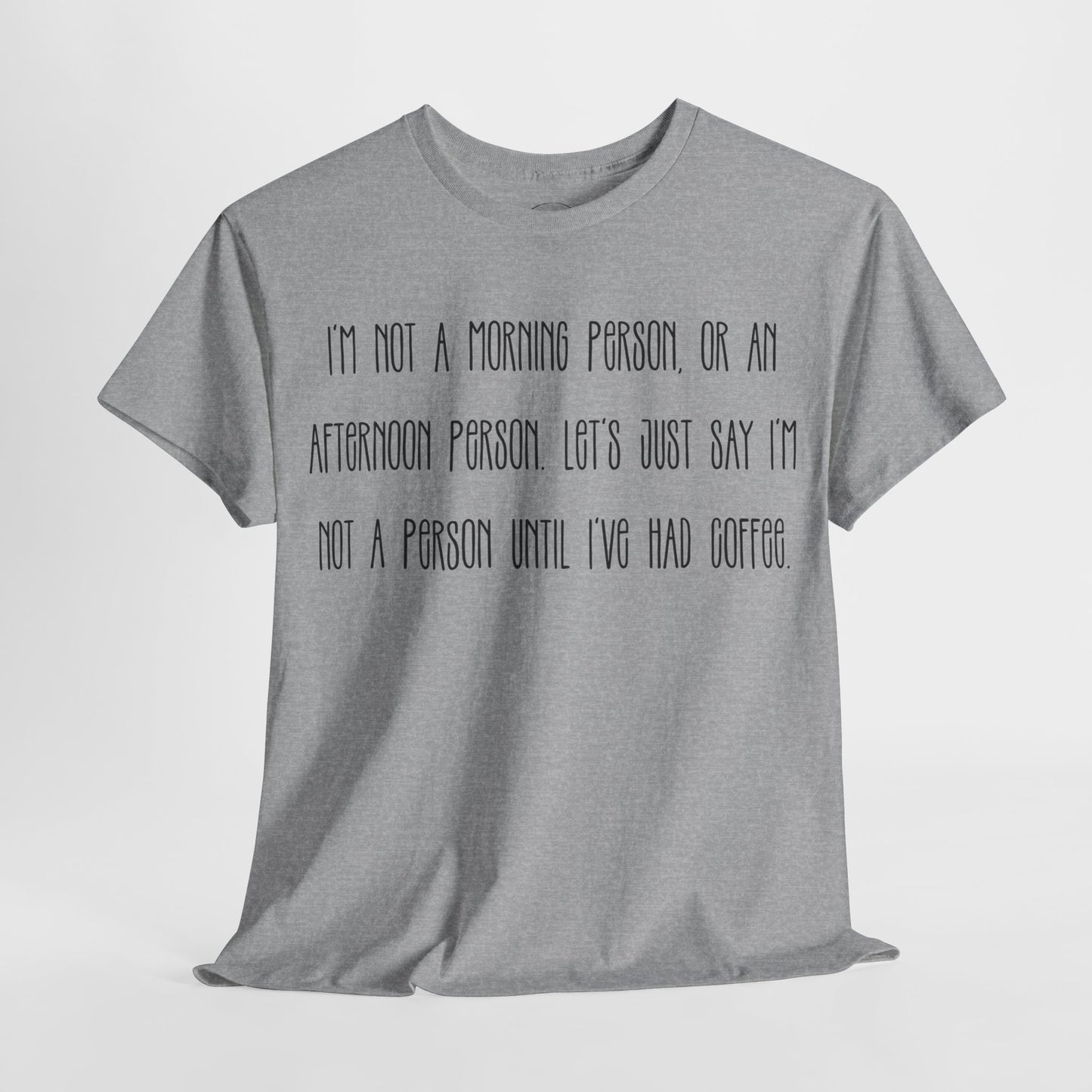 Not a Person Until I've Had Coffee t-shirt featuring a bold, humorous graphic design perfect for coffee lovers and those who aren't morning people. This funny shirt is made from soft, breathable fabric, ensuring comfort and style for casual wear. Ideal as a gift for coffee enthusiasts, this humor t-shirt showcases your love for caffeine and adds personality to your wardrobe