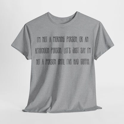 Not a Person Until I've Had Coffee t-shirt featuring a bold, humorous graphic design perfect for coffee lovers and those who aren't morning people. This funny shirt is made from soft, breathable fabric, ensuring comfort and style for casual wear. Ideal as a gift for coffee enthusiasts, this humor t-shirt showcases your love for caffeine and adds personality to your wardrobe