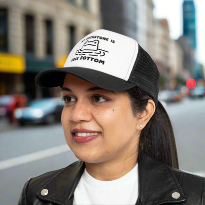 Rockbottom Trucker Cap with a vintage-style snapback design and breathable mesh back. This adjustable retro hat offers a trendy, classic look, perfect for everyday wear. Ideal for men seeking a stylish and comfortable snapback, it adds a touch of vintage flair to any casual outfit.