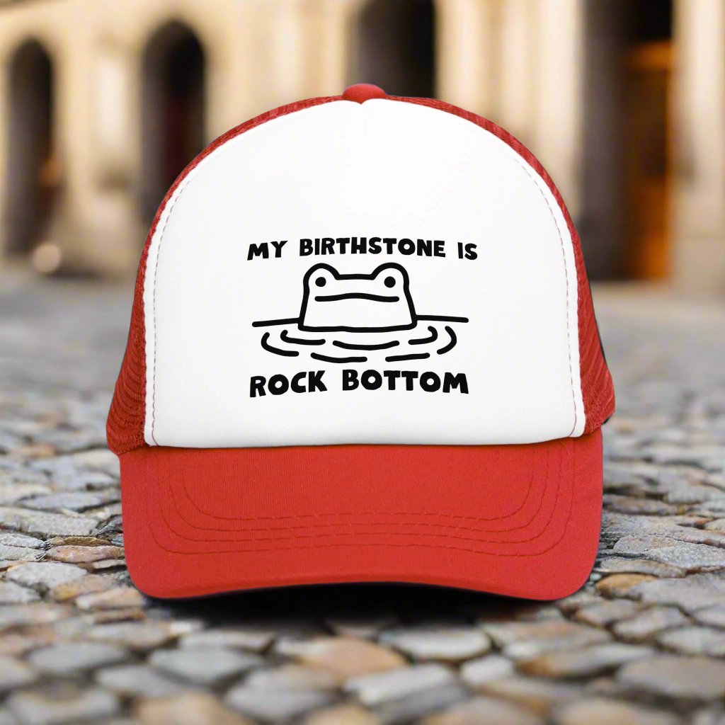 Rockbottom Trucker Cap with a vintage-style snapback design and breathable mesh back. This adjustable retro hat offers a trendy, classic look, perfect for everyday wear. Ideal for men seeking a stylish and comfortable snapback, it adds a touch of vintage flair to any casual outfit.