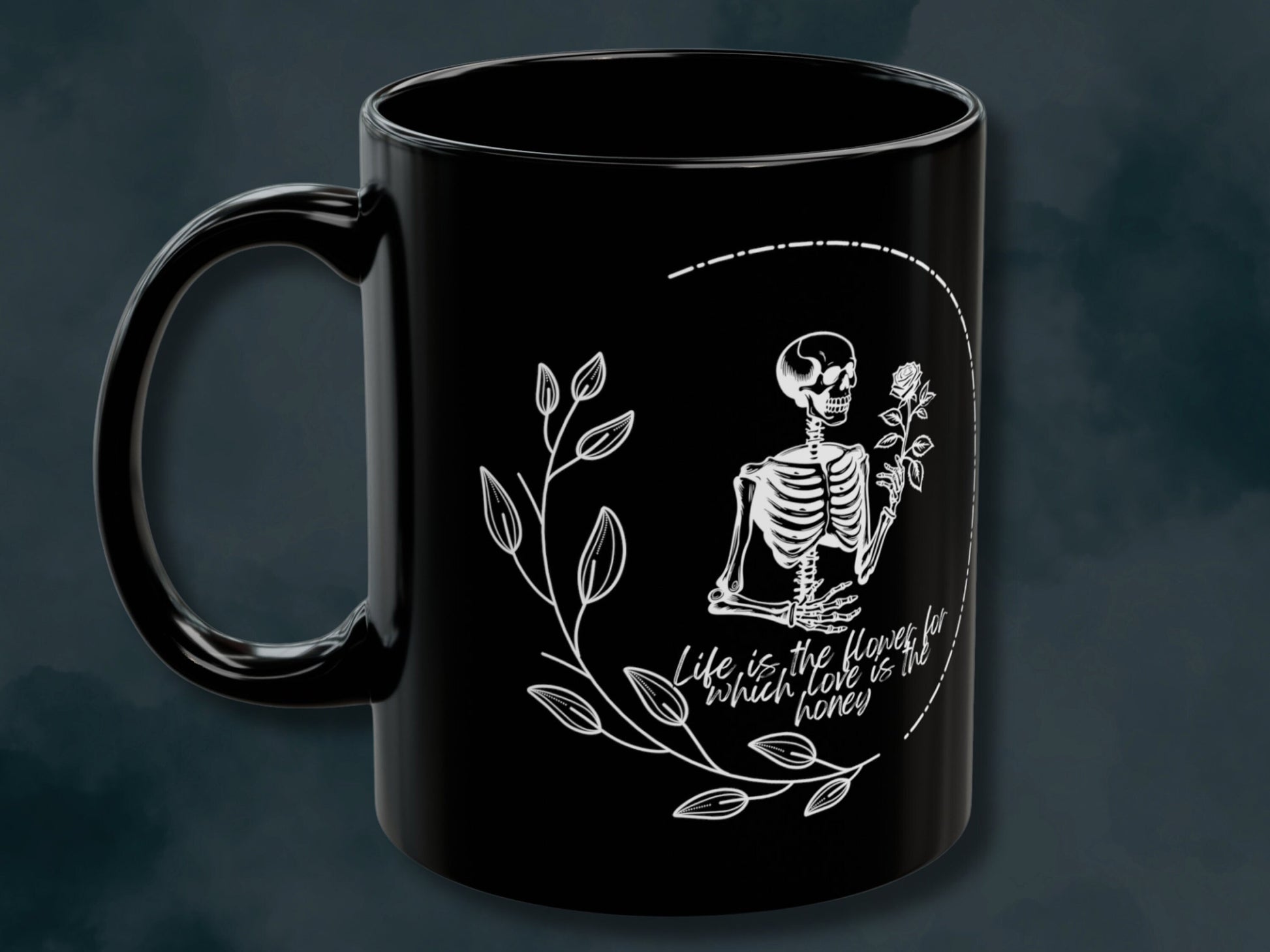 Trendy Skeleton Mug featuring a love quote with a gothic aesthetic. Perfect for coffee lovers who enjoy a spooky or whimsigoth vibe, this skeleton coffee mug makes a great gift for Halloween or year-round use. Add a touch of dark charm to your coffee routine with this unique and stylish mug.