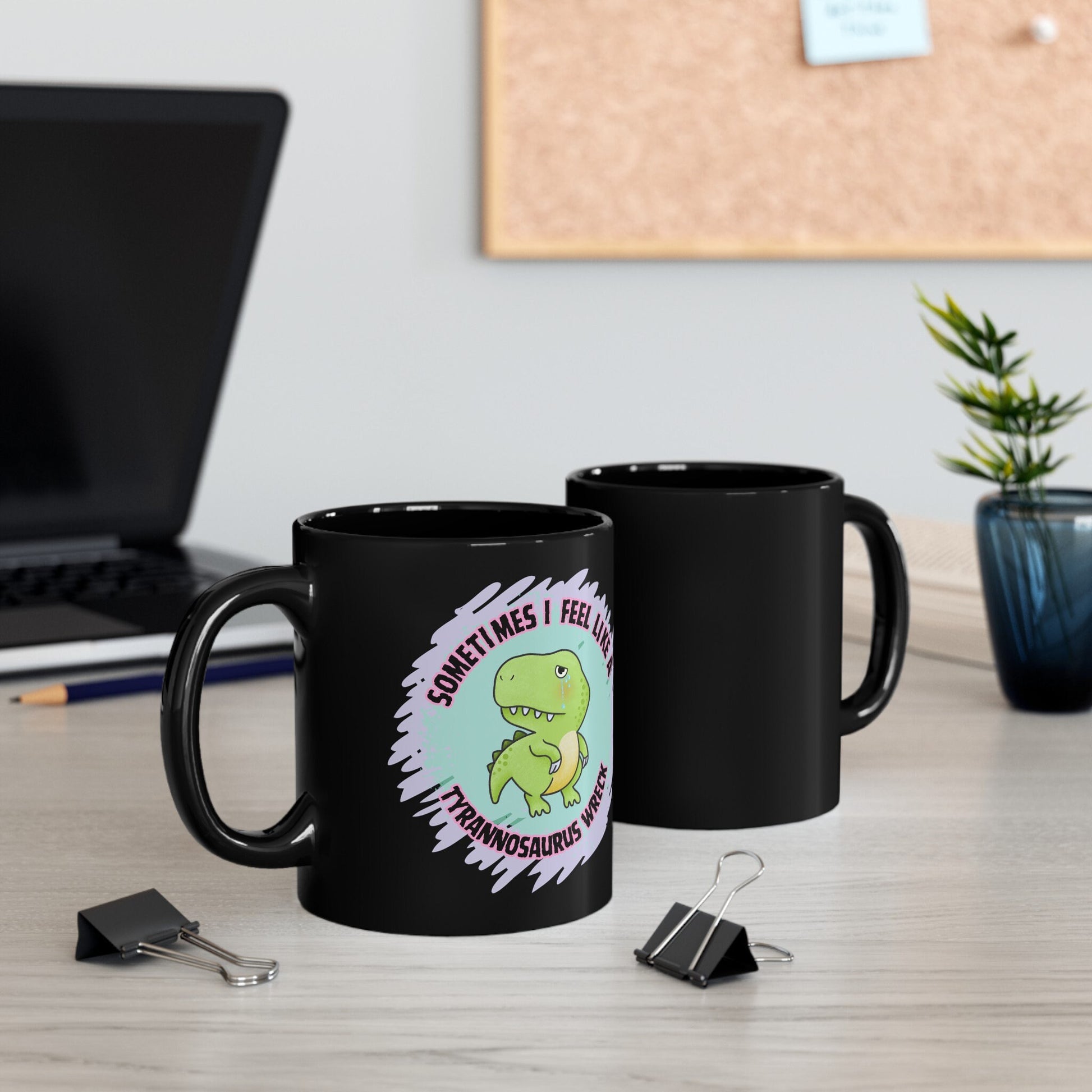 Tyrannosaurus Wreck Black Mug featuring a cute and funny dino design. This meme-inspired coffee mug is perfect for adding humor to your morning routine. A great sarcastic gift idea for dinosaur lovers, it’s ideal for anyone who enjoys a touch of whimsy with their coffee or tea.