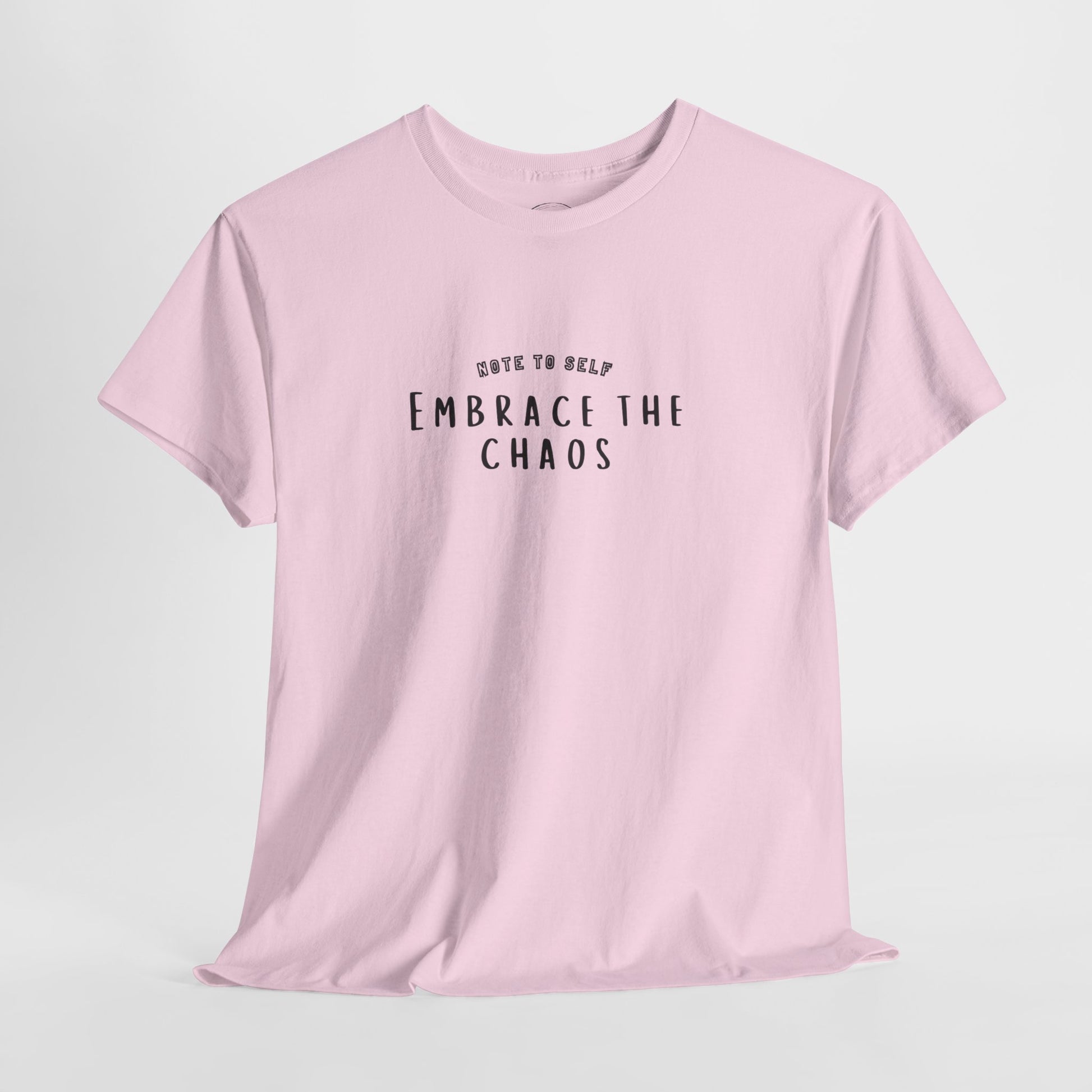 Embrace the Chaos cotton t-shirt featuring a minimalist graphic design, crafted from 100% medium-weight cotton for comfort and durability. This unisex classic fit tee is perfect for casual wear and adds a humorous touch to any outfit. Ethically produced and eco-friendly, this stylish t-shirt is ideal for those who appreciate quality and sustainability