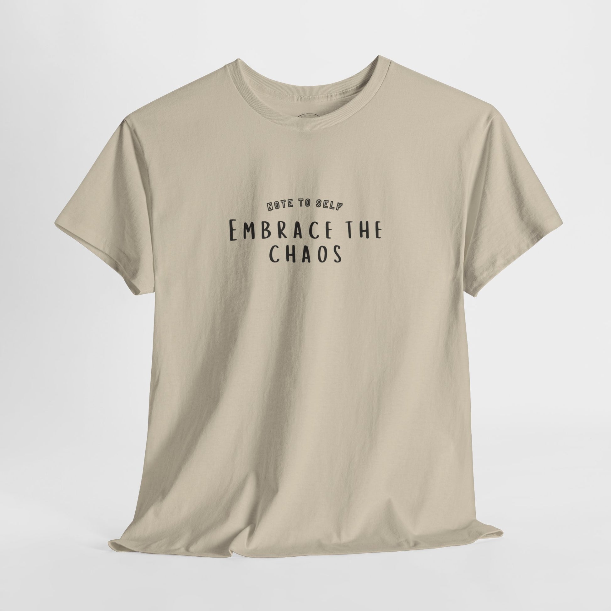 Embrace the Chaos cotton t-shirt featuring a minimalist graphic design, crafted from 100% medium-weight cotton for ultimate comfort and durability. This unisex classic fit humor t-shirt adds a humorous touch to any outfit, making it a great choice for casual wear. Perfect for those who appreciate funny shirts and embrace their weird side, this eco-friendly tee is ethically produced for quality and sustainability.