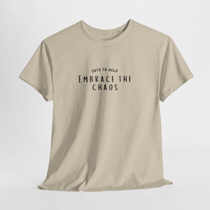 Embrace the Chaos cotton t-shirt featuring a minimalist graphic design, crafted from 100% medium-weight cotton for ultimate comfort and durability. This unisex classic fit humor t-shirt adds a humorous touch to any outfit, making it a great choice for casual wear. Perfect for those who appreciate funny shirts and embrace their weird side, this eco-friendly tee is ethically produced for quality and sustainability.