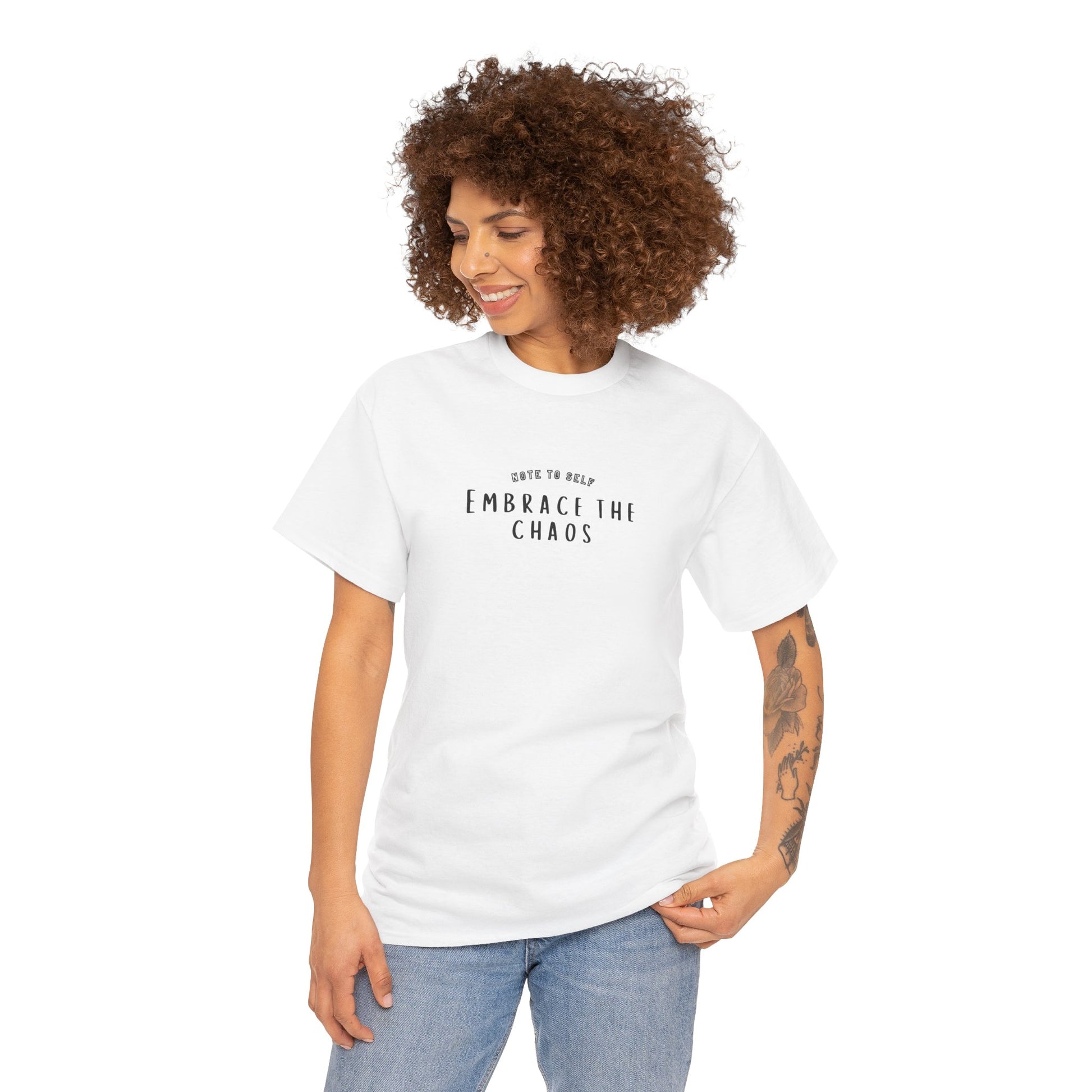 Embrace the Chaos cotton t-shirt featuring a minimalist graphic design, crafted from 100% medium-weight cotton for ultimate comfort and durability. This unisex classic fit humor t-shirt adds a humorous touch to any outfit, making it a great choice for casual wear. Perfect for those who appreciate funny shirts and embrace their weird side, this eco-friendly tee is ethically produced for quality and sustainability.